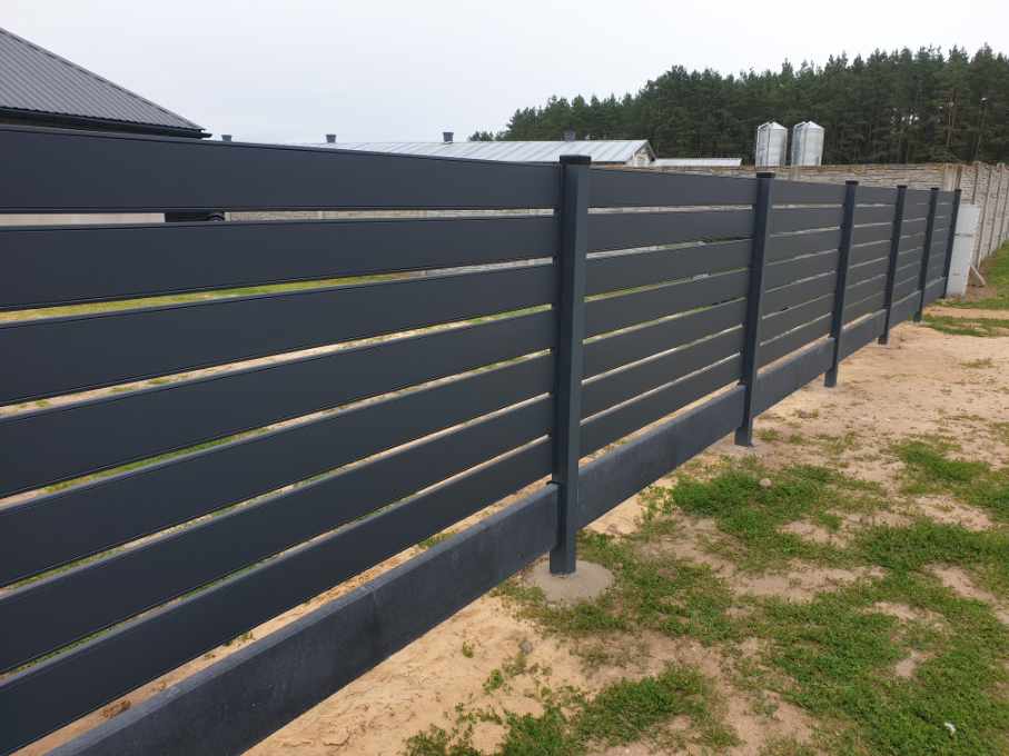 Worthouse metal fencing panels matching a home's roofline